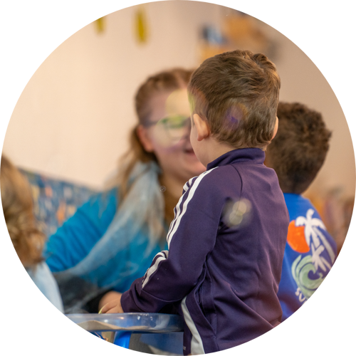 Father Holding Son on a Skateboard